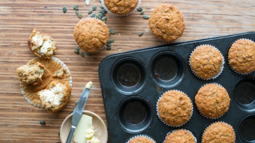 Orange, carrot, honey and pumpkin seed muffins